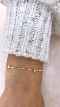 ELMAS KESİM BEYAZ TOPÇUKLU ROZ BİLEKLİK