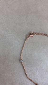 ELMAS KESİM BEYAZ TOPÇUKLU ROZ BİLEKLİK